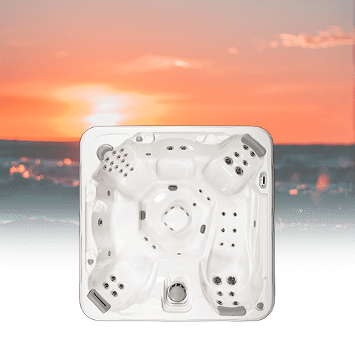 Spa tub at dusk with sunset
